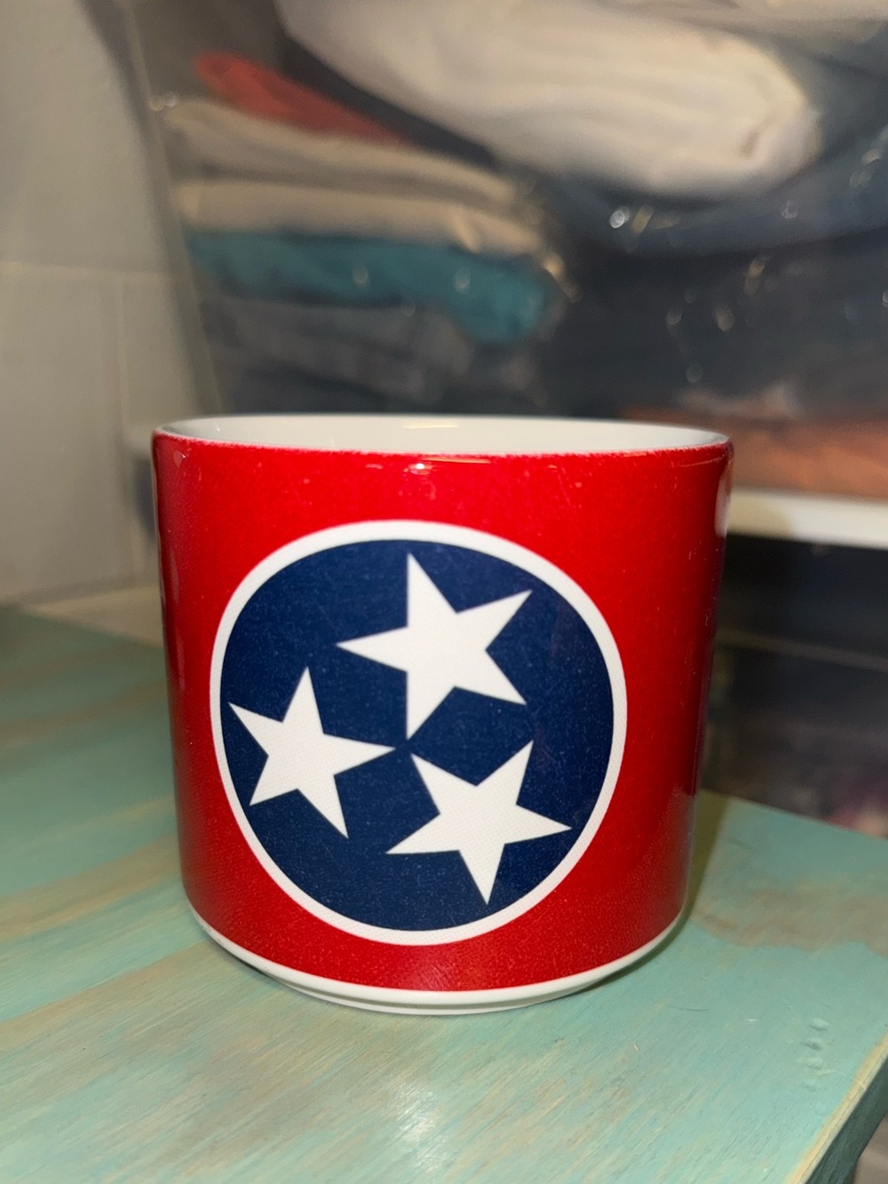 Red Ceramic Mug with Blue Star Emblem